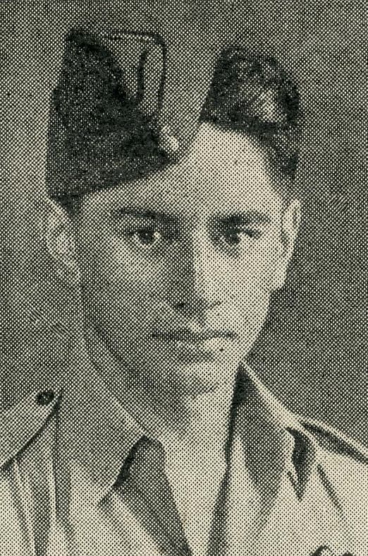 Portrait photograph of Māori fighter pilot Bert Wipiti in uniform.